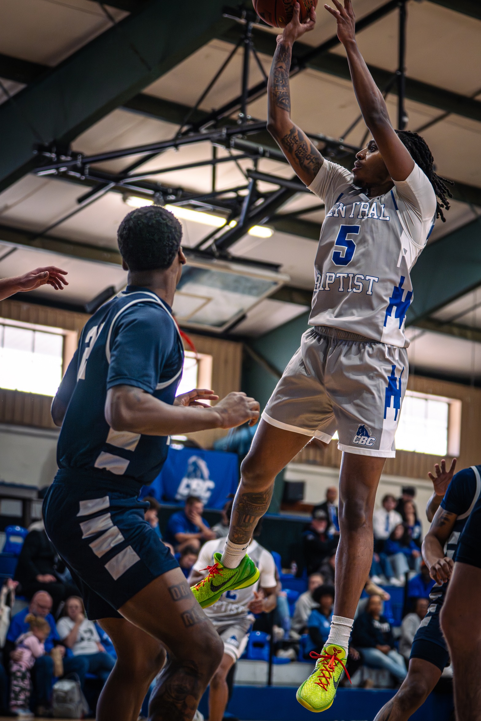 Mustangs Drop Close Contest To Trojans